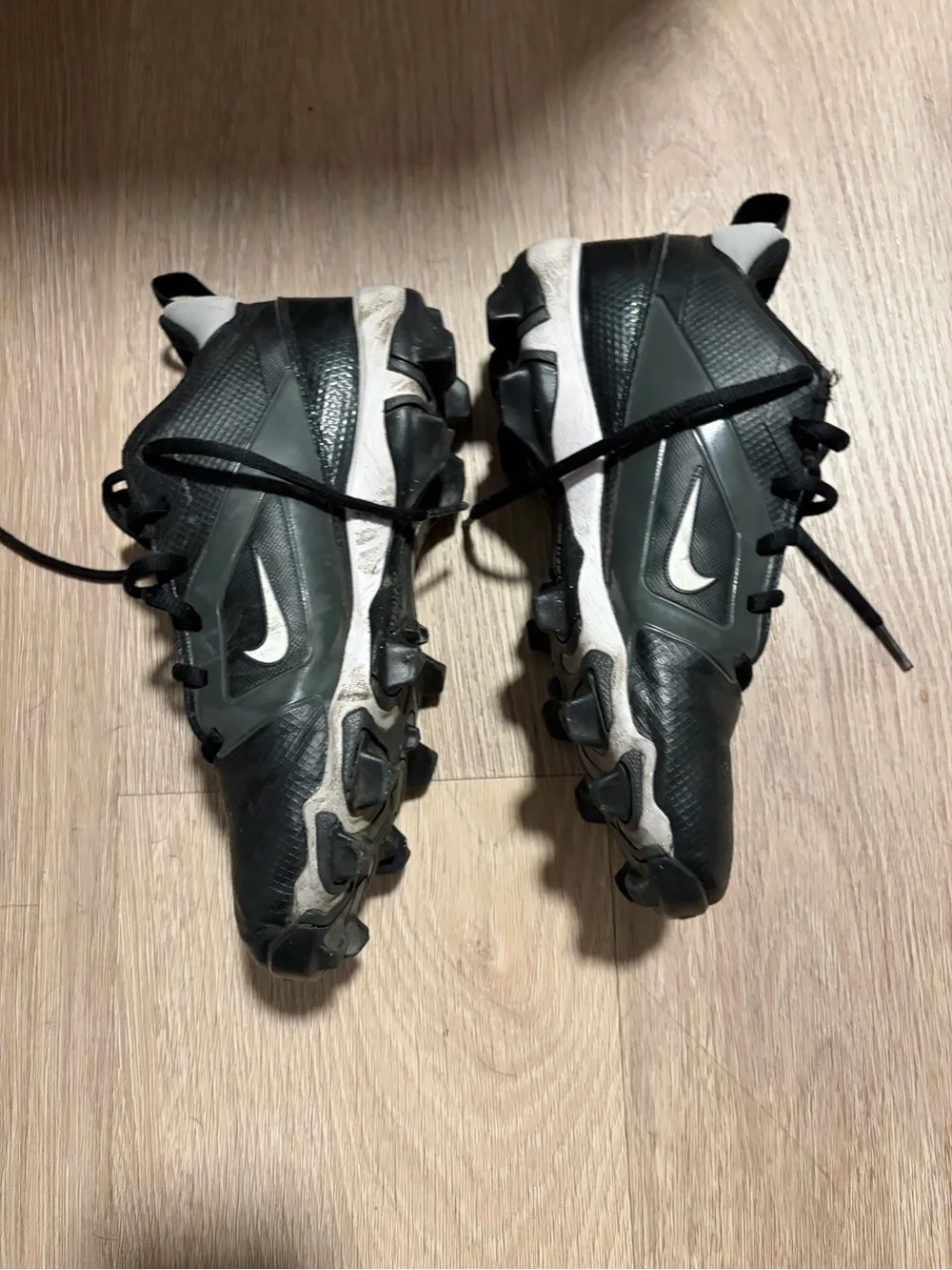 Nike Alpha Menace 4 Shark football cleats in a black colorway